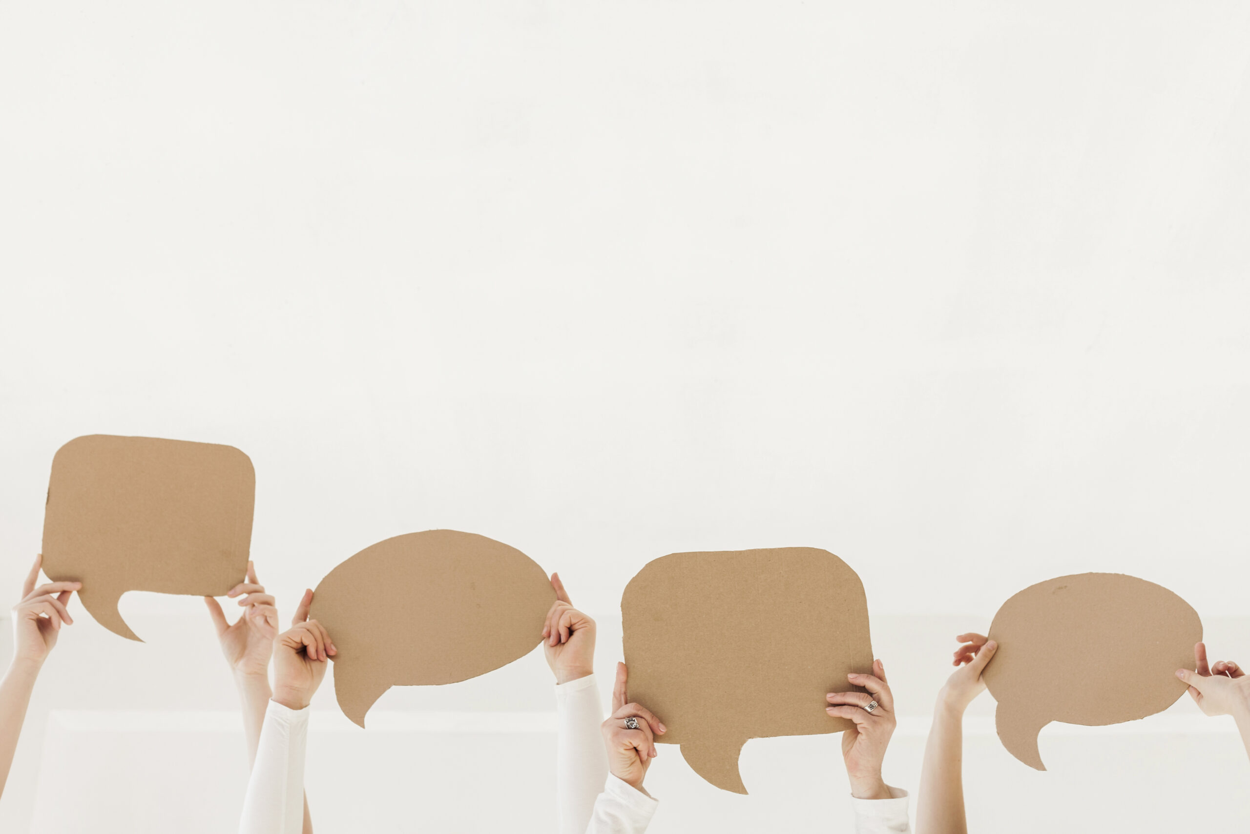 group-women-hands-holding-chat-bubbles